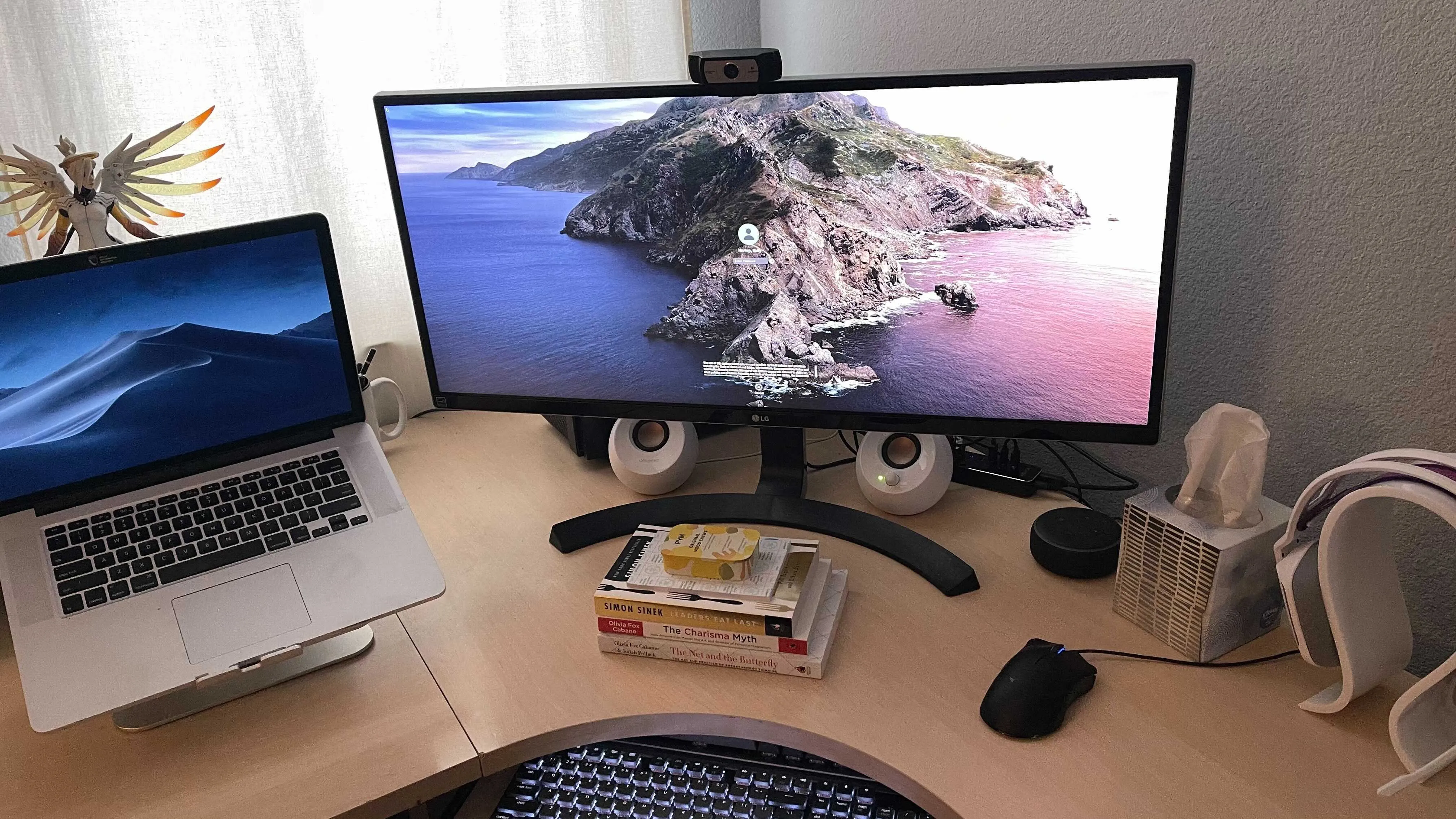 My desk, featuring a widescreen monitor